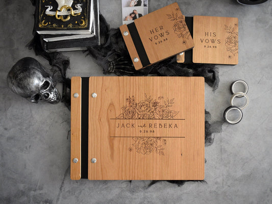 a wooden guest book with small vow books