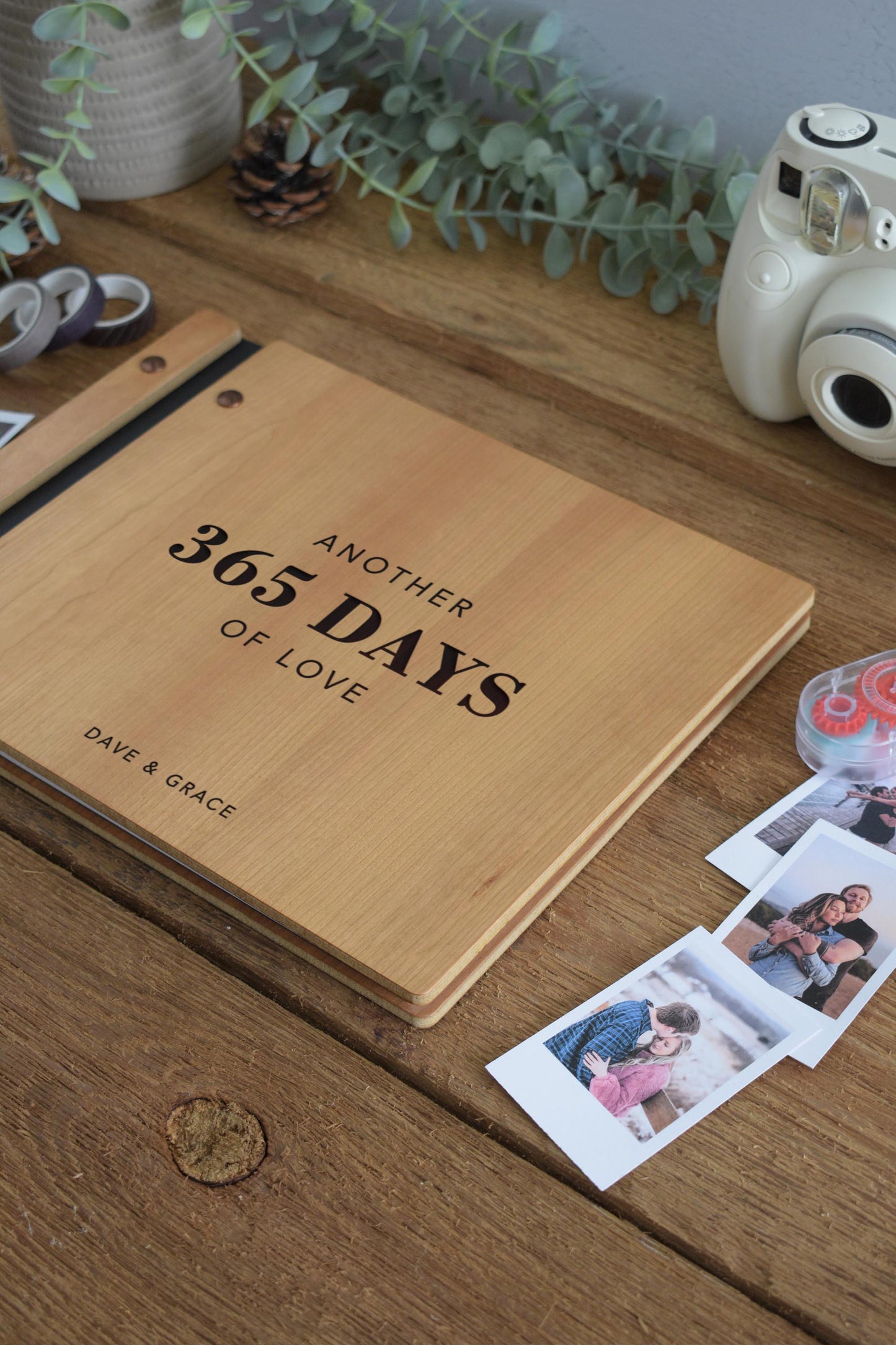 Wooden anniversary scrapbook titled Another 365 Days of Love personalized with names. Perfect gift for 1st or 5th anniversary, featuring a wood cover for photo memories and special moments. Ideal for fifth wood anniversary celebrations