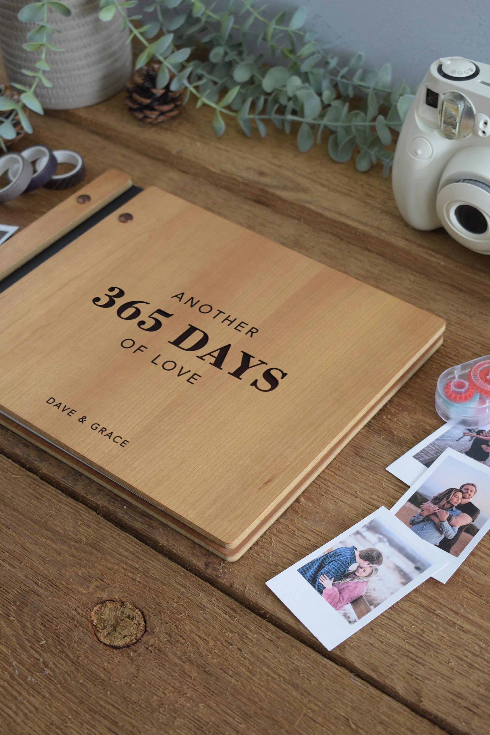 Wooden anniversary scrapbook titled Another 365 Days of Love personalized with names. Perfect gift for 1st or 5th anniversary, featuring a wood cover for photo memories and special moments. Ideal for fifth wood anniversary celebrations