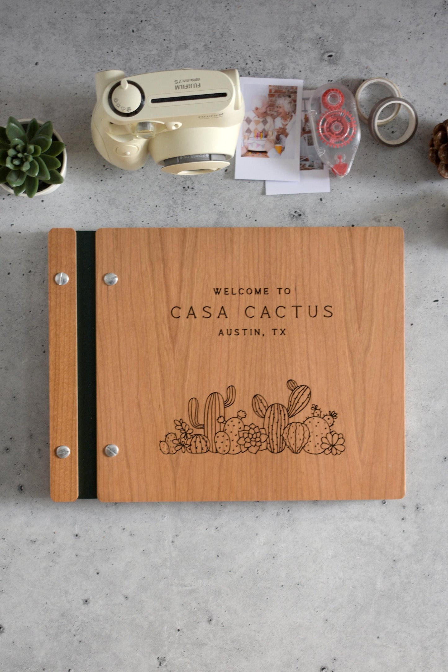 a wooden notebook sitting on top of a table