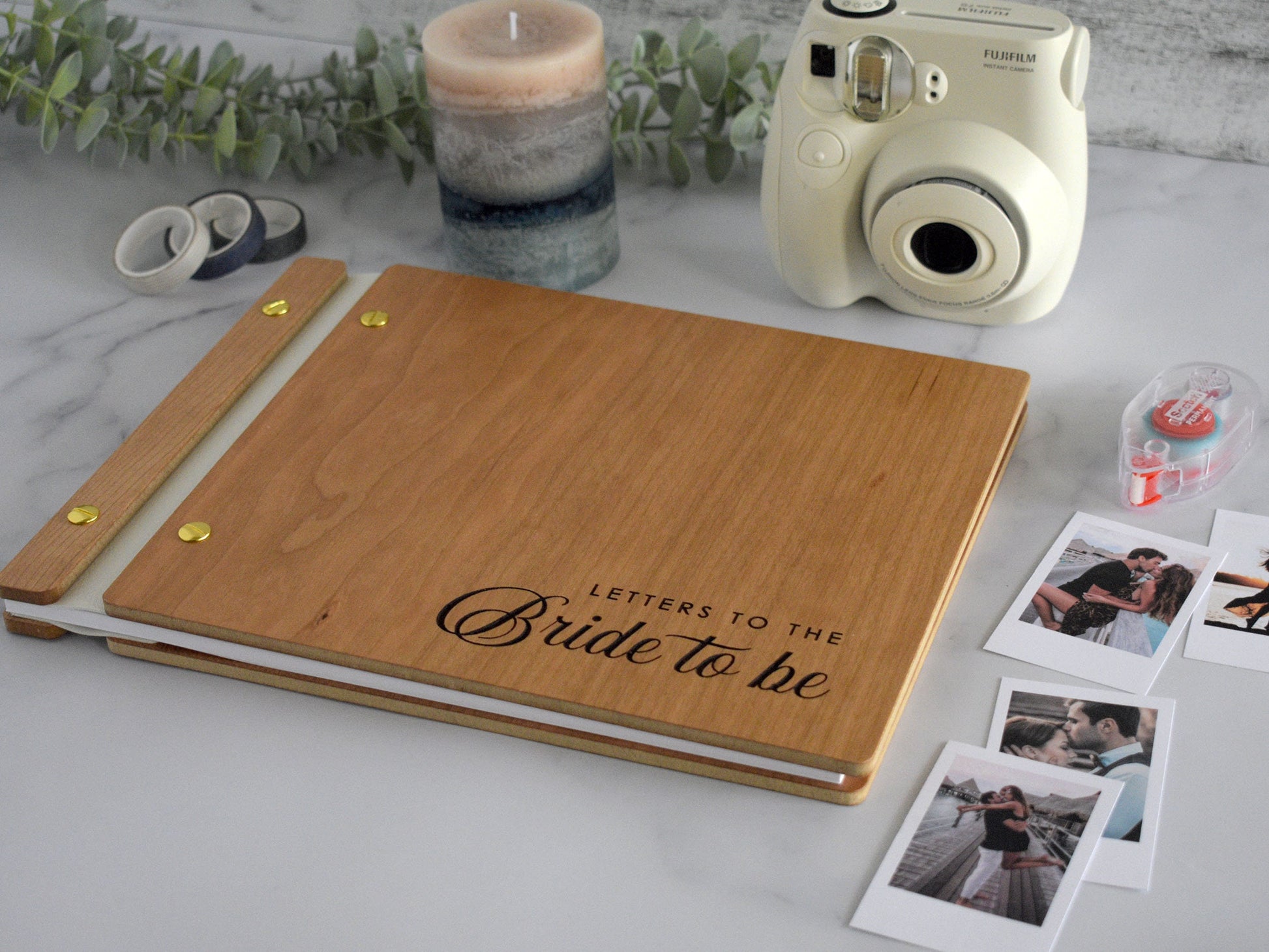 Minimalist cherry wood wedding guest book in an amber finish with engraved, customized couples names and a Minimalist design on the cover.