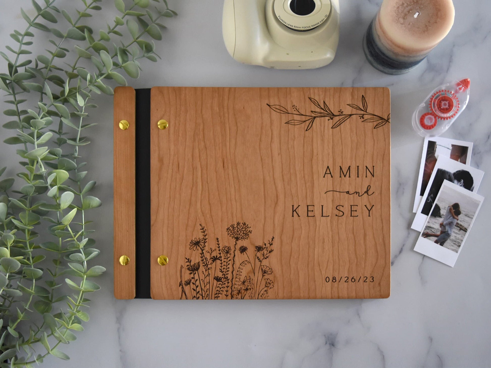 a wooden notebook with a name on it