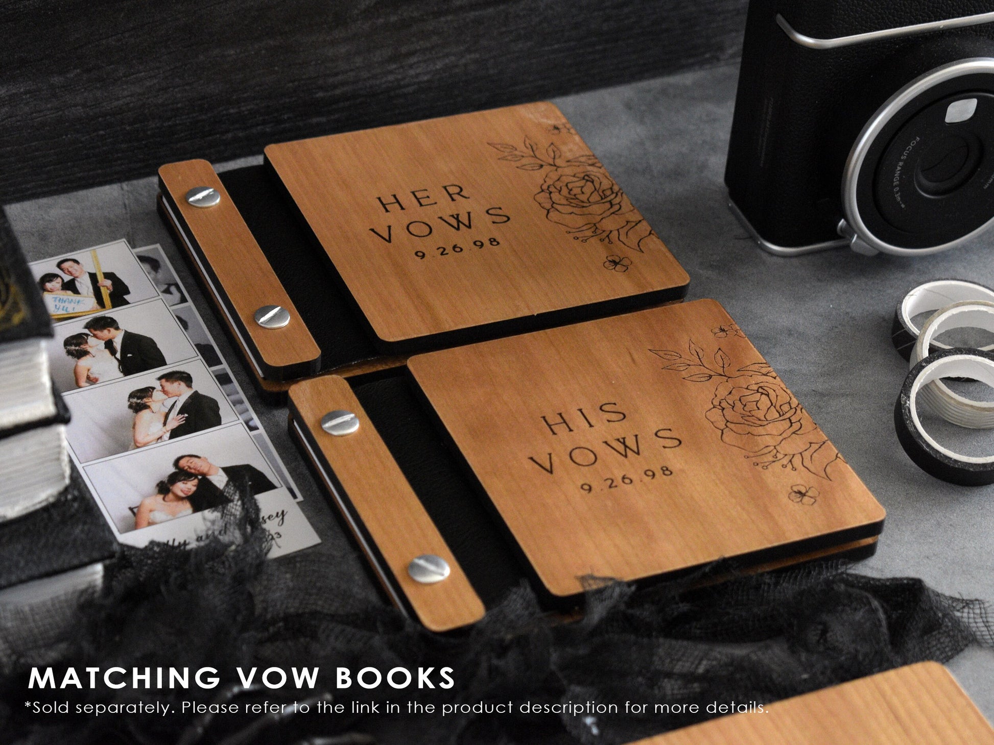 a wooden guest book with small vow books with gothic theme