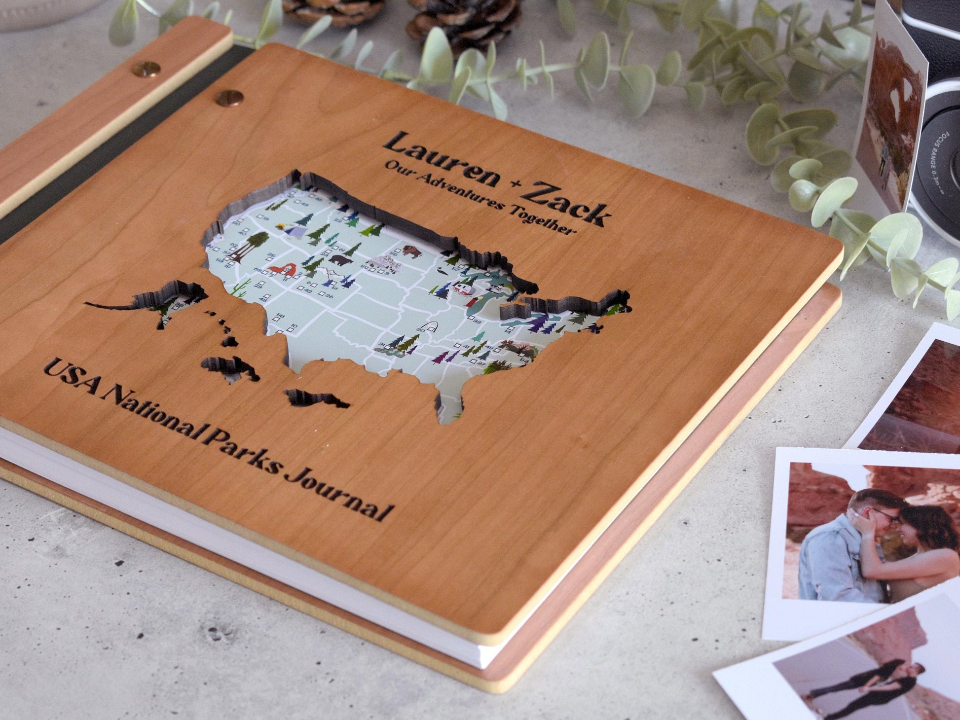 a wooden photo album with a map of the united states
