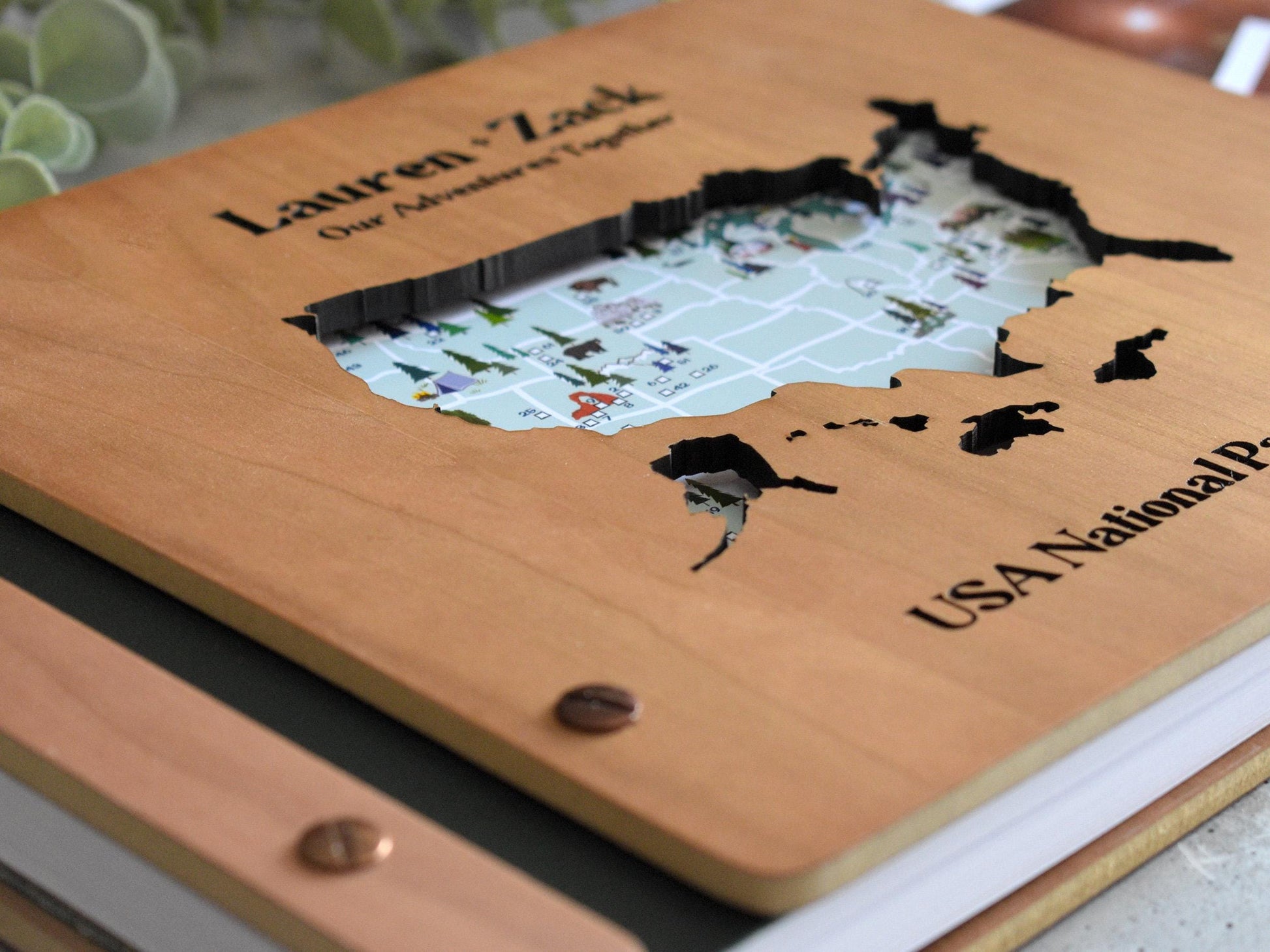a wooden book with a map of the united states